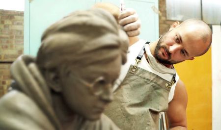 The Sculptor Andrzej Szymczyk Working for Statue